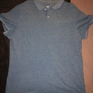 Polo, short-sleeved. Muted blue/grey toned.